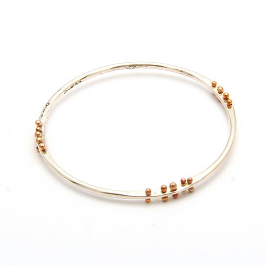 Moveable bronze ball bangle for wholesale by Tamara Kelly Designs