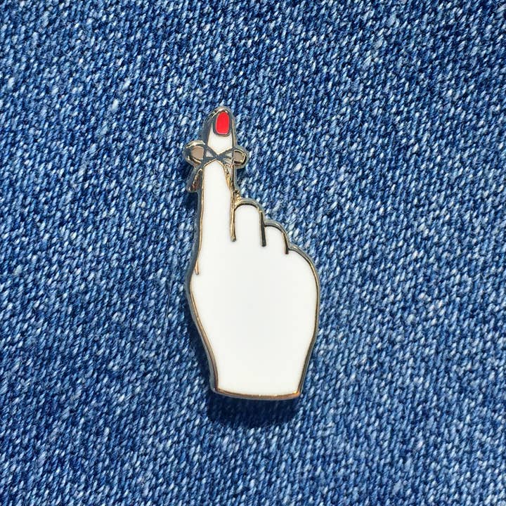 Don't Forget (String Finger) - enamel pin for wholesale by Near Modern Disaster