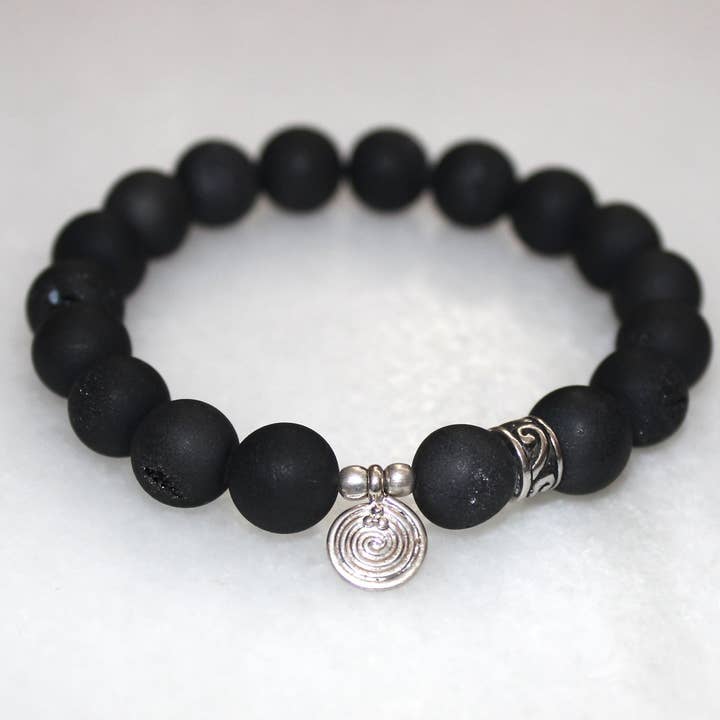 Krys S Charm Bracelet for wholesale by Margie Edwards Jewelry