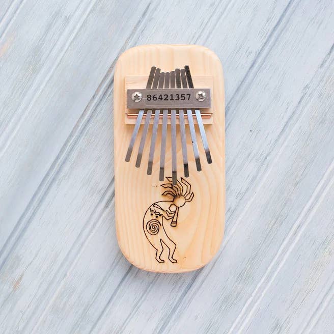 Kokopelli Engraved Thumb Piano for wholesale by Mountain Melodies LLC