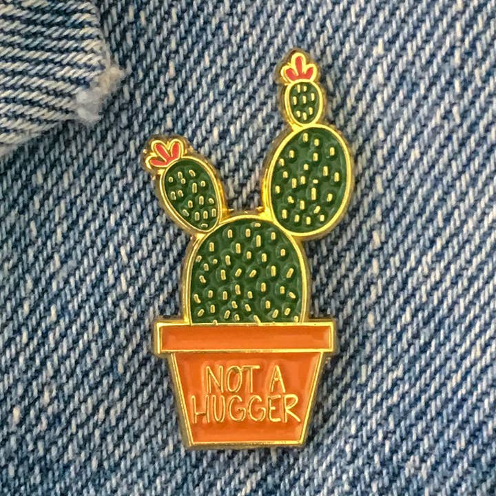 1.25" Not A Hugger Enamel Pin for wholesale by Little Lovelies Studio