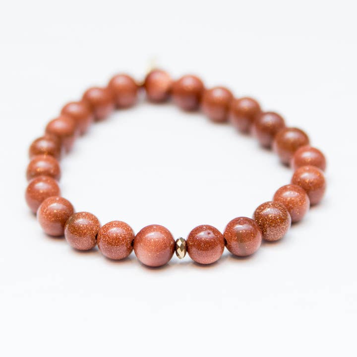 Goldstone krystal armbånd | Guld perle for engroshandel hos Infinite Warrior