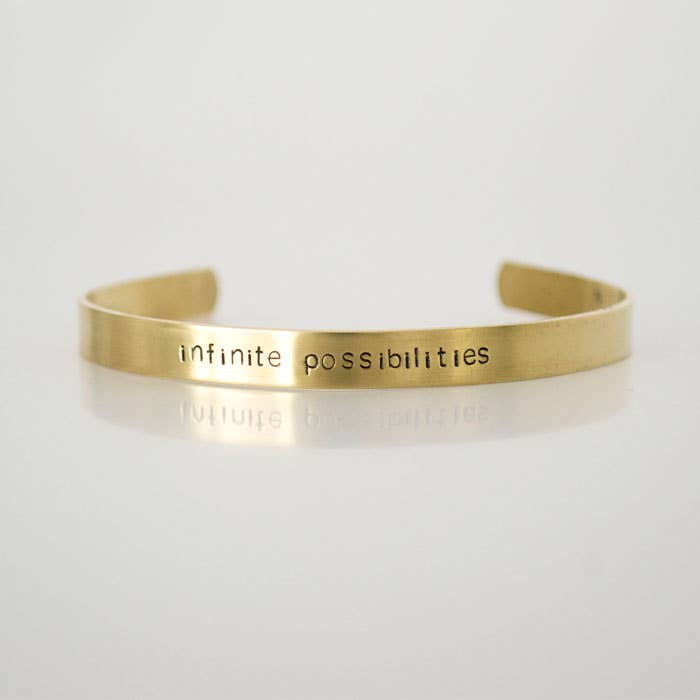 infinite possibilities, stamped brass cuff for wholesale by Grey Theory Mill