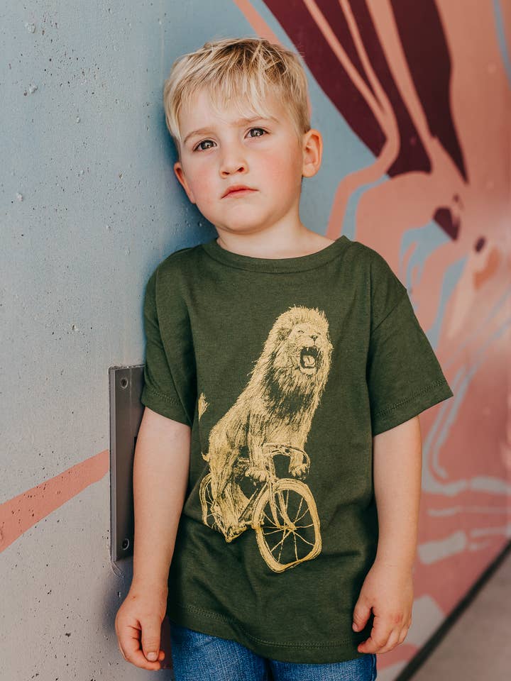 Lion On A Bicycle Children's Tee for wholesale by Dark Cycle Clothing