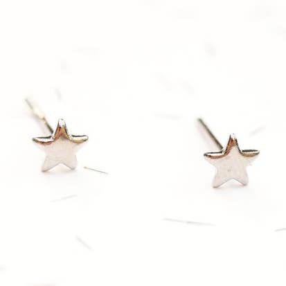 Tiny Silver Star Studs for wholesale by Diament Jewelry